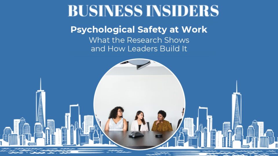 Diverse team talking openly in an office meeting, illustrating psychological safety at work